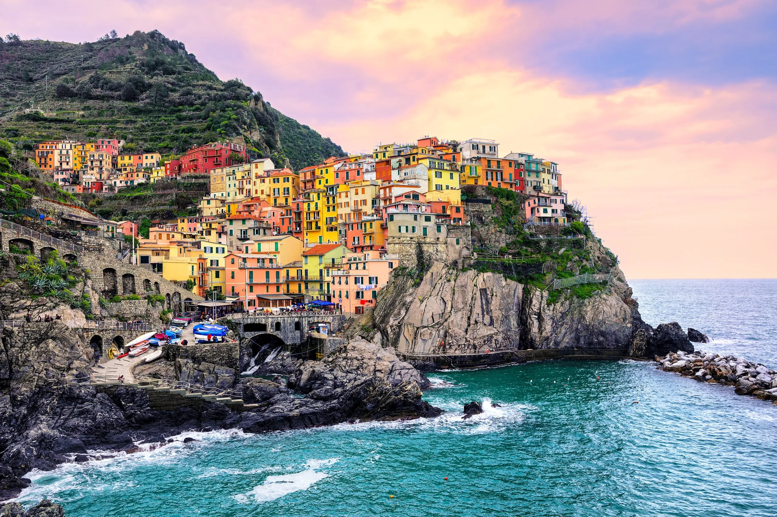Colorful houses on a rock in Manarola, Cinque Terre, Italy